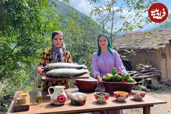 ببینید| غذای روستایی در ایران؛ تهیه غذا با ماهی قزل آلا و میوه خشک