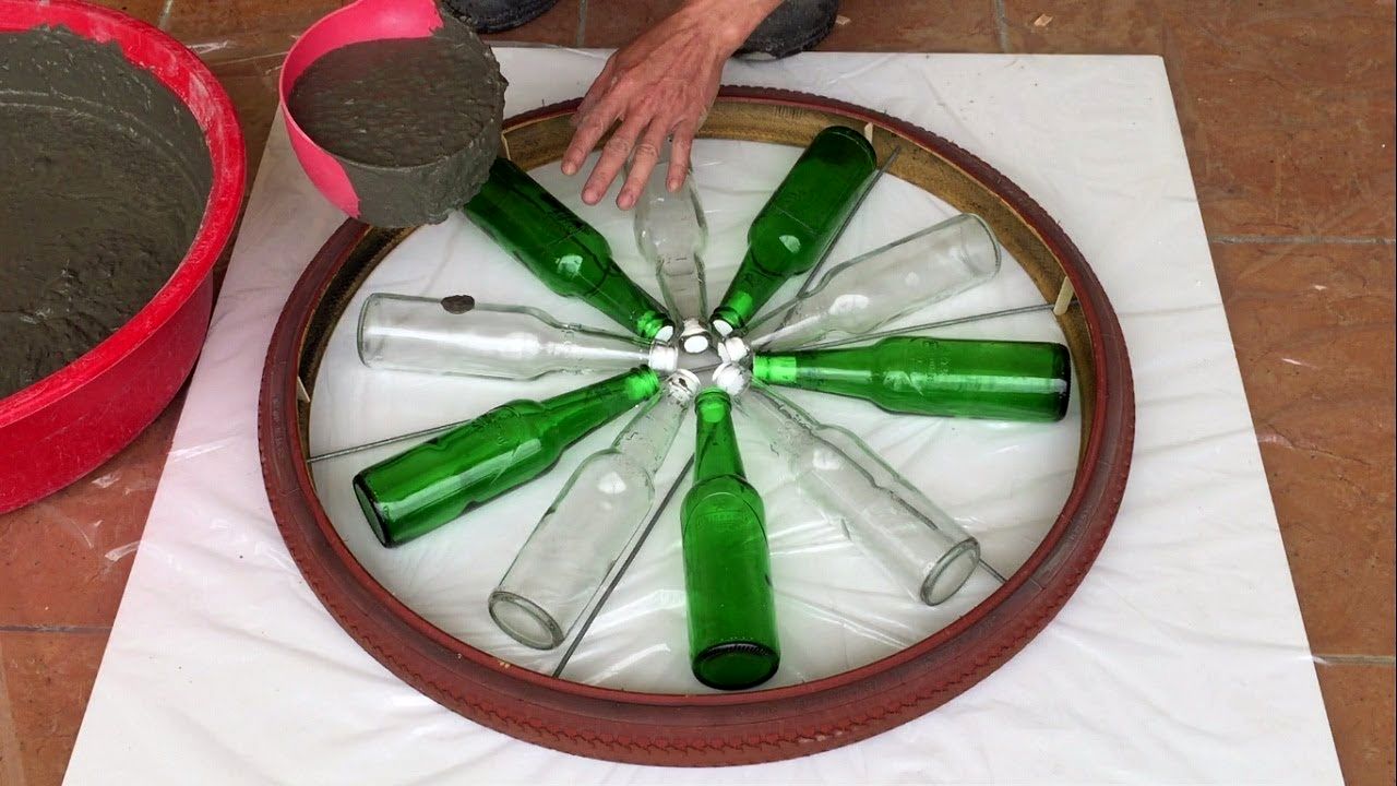 (ویدئو) ایده شگفت انگیز؛ با بطری شیشه ای و سیمان این میز قهوه خوری را بسازید 