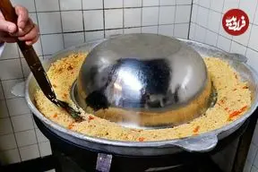 ببینید| غذای خیابانی در آمریکا؛ پخت ازبکی پلو با گوشت بره در شیکاگو