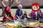 ببینید| غذای روستایی در افغانستان؛ کباب کردن ماهی کنار رودخانه توسط زوج روستایی