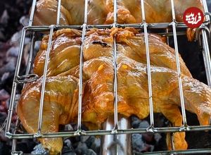 ببینید| غذای خیابانی در تایلند؛ کباب کردن 200 کیلو مرغ در بانکوک