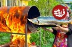ببینید؛ غذای روستایی در آذربایجان؛ کباب کردن ماهی خاویاری بزرگ در بشکه