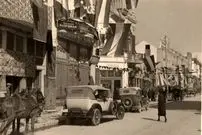 عکس؛ سفر در زمان؛ در اولین قنادی خارجی تهران چه نوع شیرینی‌هایی فروخته می‌شد؟