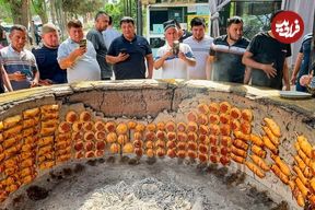 ببینید؛ غذای خیابانی در ازبکستان؛ پخت سمبوسه در تنور بزرگ در نمنگان 