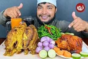 ببینید| غذا خوردن با صدا؛ خوردن 4 کیلو ماهی و مرغ کبابی به روش جوان بنگلادشی