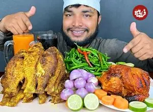 ببینید| غذا خوردن با صدا؛ خوردن 4 کیلو ماهی و مرغ کبابی به روش جوان بنگلادشی