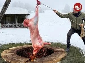 ببینید| غذای روستایی در آذربایجان؛ کباب کردن بره کامل در تنور در هوای برفی