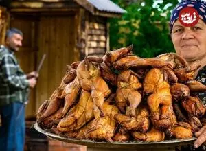 ببینید| غذای روستایی در آذربایجان؛ دودی کردن مرغ به روشی خاص