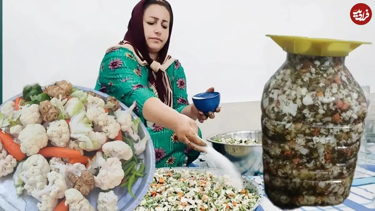 (ویدئو) تهیه ترشی محلی خانگی به شیوه تماشایی بانوی روستایی گیلانی