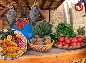 ببینید| غذای روستایی در کنیا؛ پخت ماهی در برگ موز و روی آتش 