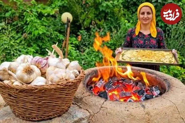 ببینید| غذای روستایی در ایران؛ پخت حرفه ای نان سیر در طبیعت روستا