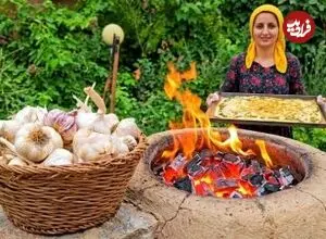 ببینید| غذای روستایی در ایران؛ پخت حرفه ای نان سیر در طبیعت روستا