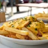 سیب‌زمینی با پنیر چدار خانگی؛ کش‌دار، خوش‌عطر و وسوسه‌انگیز!