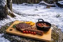 ببینید| غذای روستایی در آمریکا؛ پخت استیک روی آتش و در هوای برفی جنگل