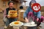 ببینید| غذای روستایی در افغانستان؛ پخت نان سنتی و شیر برنج در هوای سرد روستا 