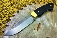 ببینید| فرآیند ساخت یک چاقوی خاص با تیغه اره زنگ زده و به روش آهنگر روس