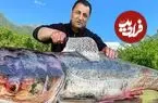 ببینید| غذای روستایی در آذربایجان؛ کباب کردن ماهی کپور نقره ای غول پیکر