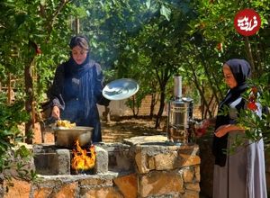 (ویدئو) روش تماشایی مادر و دختر روستایی کردستانی برای طبخ پلو بریانی روی ذغال