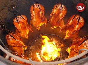 ببینید| غذای خیابانی در تایوان؛ مهارت آشپزهای خیابانی در کباب مرغابی در تایپه