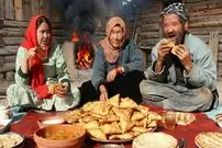 ببینید| غذای روستایی در افغانستان؛ پخت سمبوسه ی سنتی توسط زوج مسن افغان
