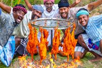ببینید؛ غذای روستایی در هند؛ کباب کردن مرغ طعم دار شده با کمک چرخ دوچرخه!
