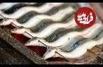 ببینید| غذای خیابانی در ژاپن؛ مهارت آشپز خیابانی در برش و کباب کردن مارماهی در توکیو