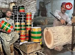ویدئو| مراحل تماشایی ساخت دُهُل با تنه درخت در کارگاهی در پاکستان