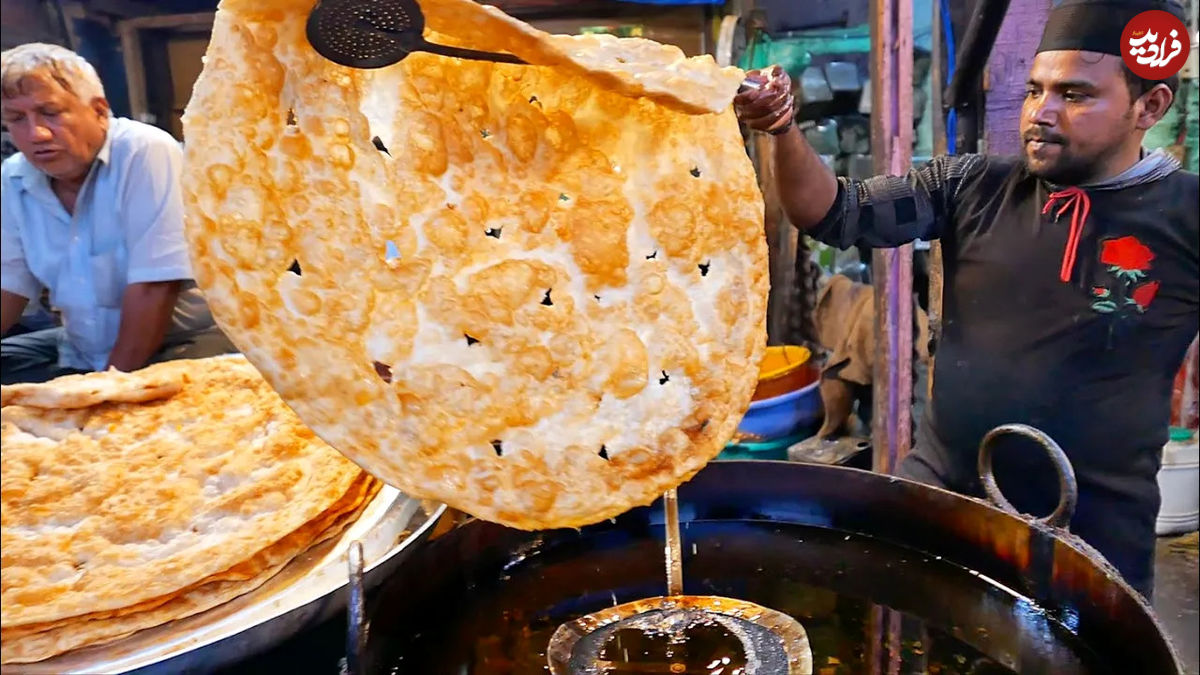 (ویدئو) غذای خیابانی در هند؛ پخت حلوای کشمیری و نان 