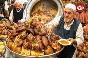 ببینید| غذای خیابانی در افغانستان؛ پخت کابلی پلو با 100 کیلو برنج و 20 کیلوگرم گوشت در کابل