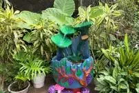 ببینید| چگونه با چرخ قدیمی دوچرخه و سیمان یک حوض زیبا بسازیم؟