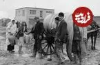 عکس| سفر به تهران قدیم؛ گاری آب شاهی در حال عبور از خیابان فردوسی؛ سال 1330