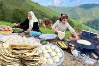ببینید| غذای روستایی در ایران؛ پخت نان تافتون روی ساج و عدسی در طبیعت