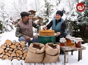 ببینید| غذای روستایی در آذربایجان؛ پخت کیک عسلی در هوای برفی روستا