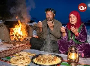 ببینید| غذای روستایی در افغانستان؛ پخت کوفته با مرغ روی آتش برای افطار