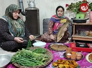 ببینید| غذای روستایی در ایران؛ پخت سبزی پلو با ماهی و نان تازه در روستا