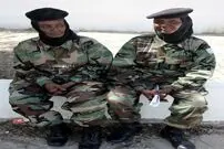 (عکس) زنان نظامی سومالی با اسلحه‌های چوبی