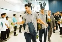 (عکس) امضای مهدی طارمی روی پرچم سه‌رنگ ایران