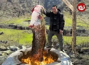 ببینید| غذای روستایی در آذربایجان؛ صید یک گربه ماهی بزرگ و کباب کردن آن در تنور