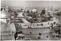 عکسی رنگی از یک میوه فروشی در همدان، ۹۶سالِ قبل