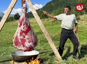 (ویدئو) غذای روستایی در آذربایجان؛ پخت ران بزرگ گاو در طبیعت