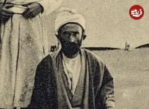 عکس| سفر زمان؛ تصویری از درویش مارگیر با یک مار بزرگ در دوران قاجار
