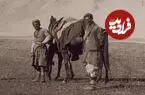 عکس| سفر زمان؛ منظرۀ زیبای یک کاروان در نزدیکی کوه بیستون در دوران قاجار