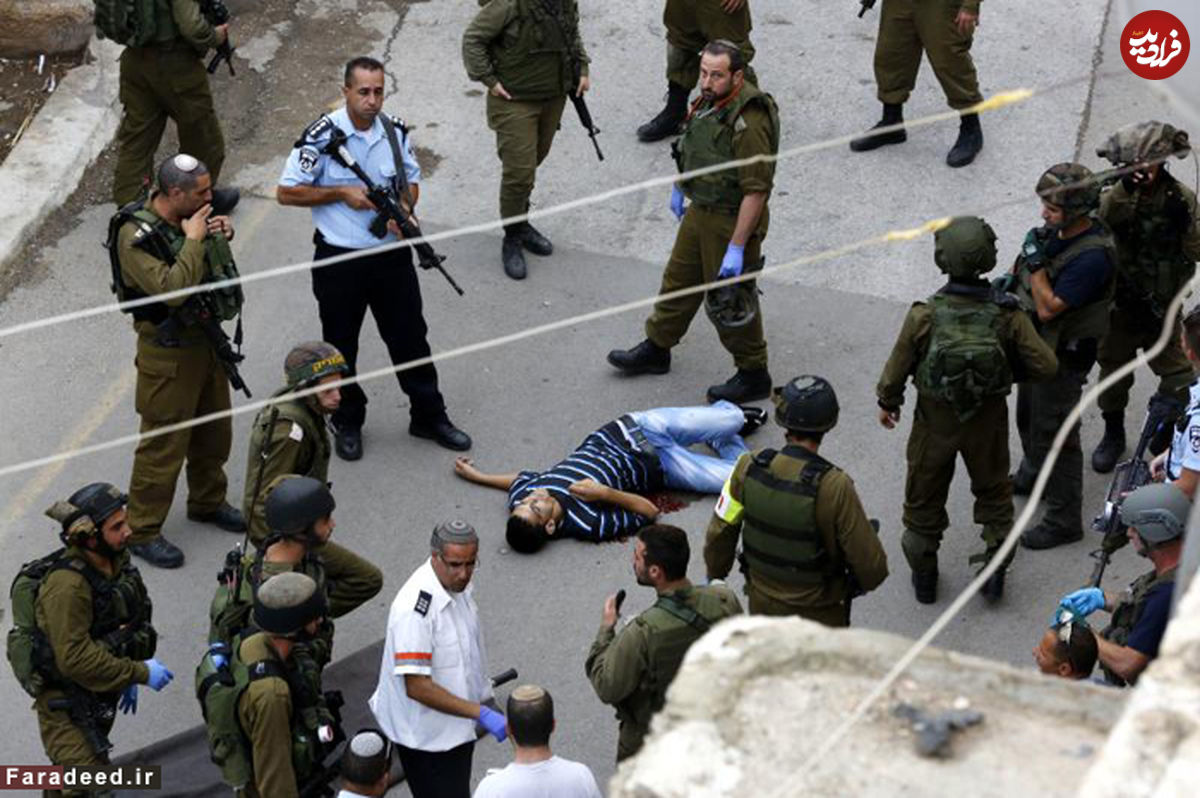 (تصاویر) بی‌حرمتی به‌جسد دو فلسطینی