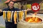 ببینید| غذای روستایی در آذربایجان؛ صید تعدادی ماهی قزل آلا و کباب کردن آنها در تنور 