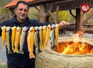 ببینید| غذای روستایی در آذربایجان؛ صید تعدادی ماهی قزل آلا و کباب کردن آنها در تنور 